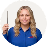 Total Branded employee Alex holding the Silver Metal Straw