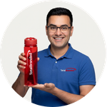 Total Branded employee Dhruv holding the Evander Recycled Colour Water Bottle