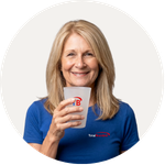 Total Branded employee Jill holding the Glastonbury Reusable Plastic Cup