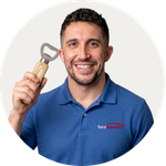Total Branded Managing Director Kyle holding the Brama Wooden Bottle Opener