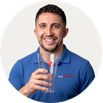 Total Branded Managing Director Kyle holding the 1 Pint Highball Tumbler