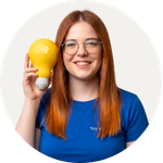 Total Branded employee Emma holding the Stress Light Bulb