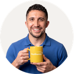 Total Branded Managing Director Kyle holding the Cambridge Colour Gloss Finish Mug