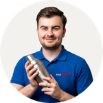 Total Branded employee Leighton holding the Gaudie Recycled Stainless Steel Cocktail Shaker