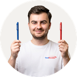 Total Branded employee Leighton holding the Echo Recycled Ball Pen