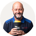 Total Branded employee Nathan holding the Brite-Americano® Tyre 350ml Insulated Tumbler