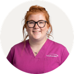 Total Branded employee Phoebe wearing the Panacea 160 g/m2 Unisex Short Sleeve Service Top